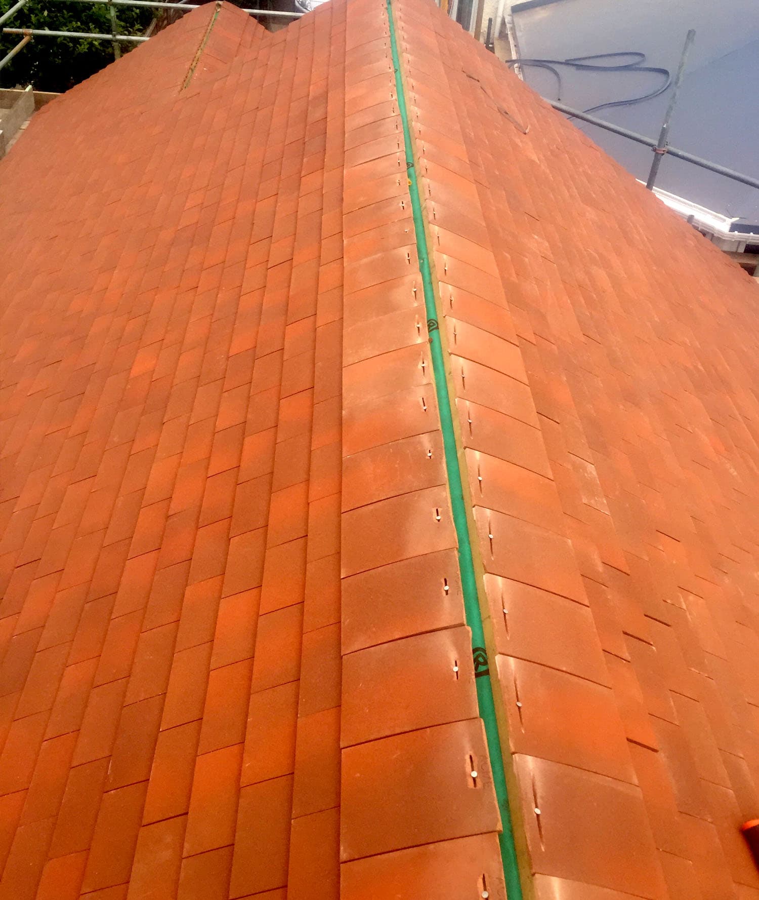 Tiled roof replacement showing new ridge line