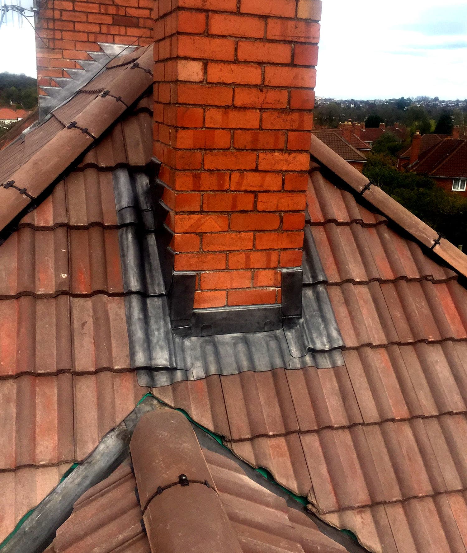 Roof tiling work in progress with battens and membrane