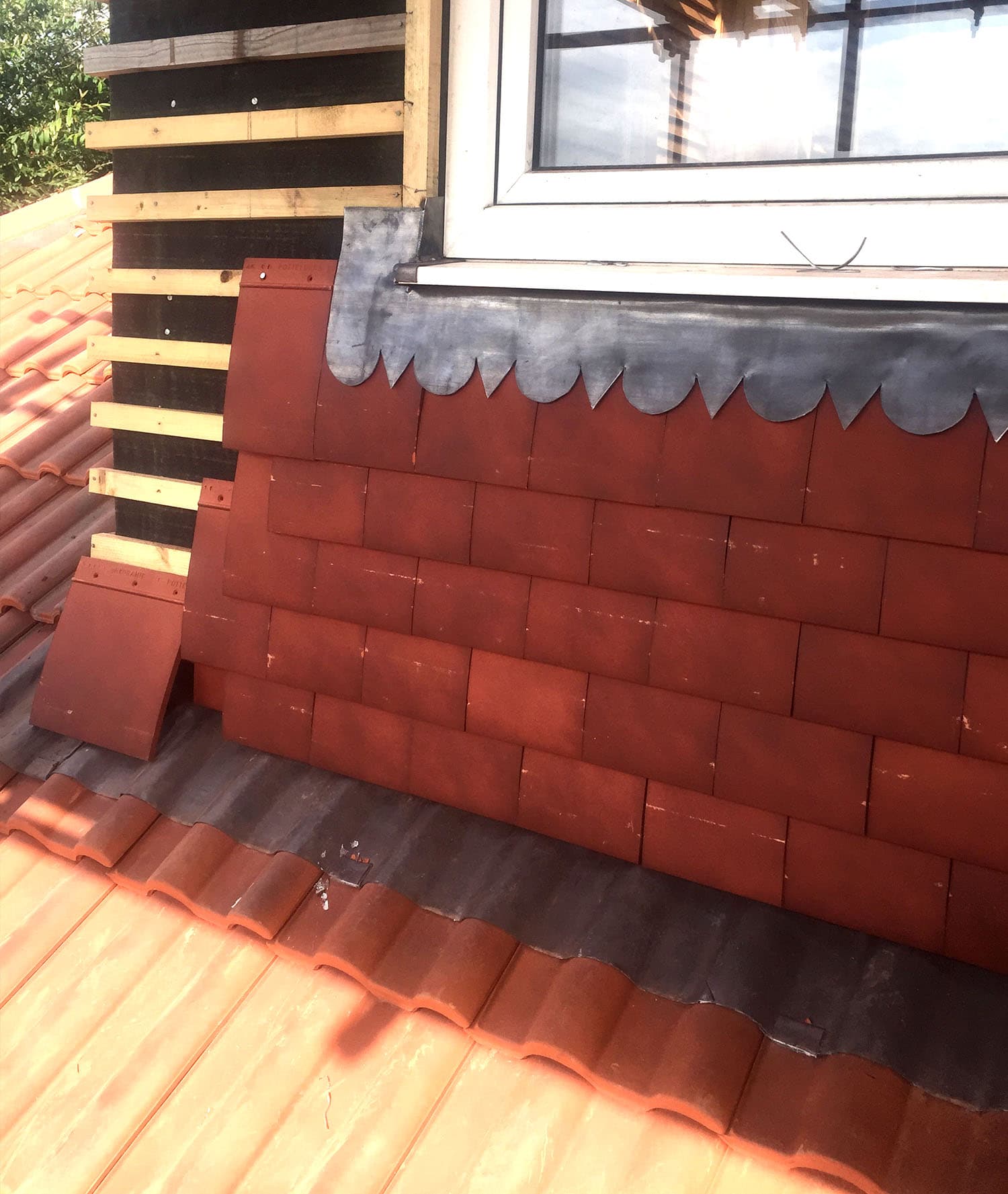 Tiling detail around a roof window